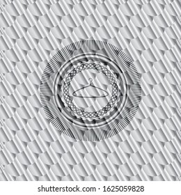 hanger icon inside silver badge. Scales pattern. Vector Illustration. Detailed.