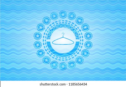 hanger icon inside sky blue water wave style badge.