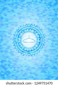 hanger icon inside sky blue emblem with mosaic background