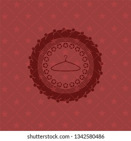 hanger icon inside vintage red emblem