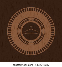 hanger icon inside vintage wood emblem