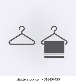 Hanger icon with towel . Vector illustration