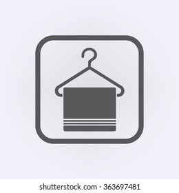 Hanger icon with towel . Vector illustration