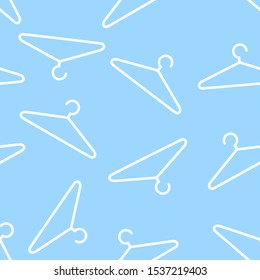 Hanger seamless pattern on blue background. flat design vector illustration.