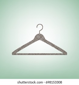 Hanger sign illustration. Vector. Brown flax icon on green background with light spot at the center.