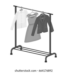 A hanger with things in the wardrobe.Making movie single icon in monochrome style vector symbol stock illustration web.