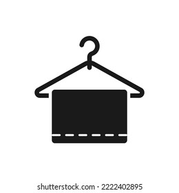 Hanger and towel black silhouette symbol. Spa, laundry, bathroom icon.