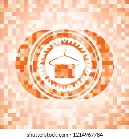 hanger with towel icon inside abstract orange mosaic emblem with background
