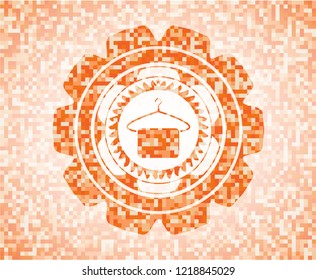 hanger with towel icon inside abstract emblem, orange mosaic background