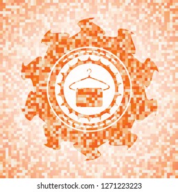 hanger with towel icon inside abstract orange mosaic emblem with background