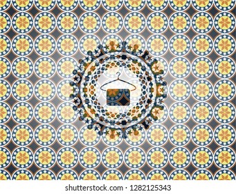 hanger with towel icon inside arabesque badge. arabic decoration.