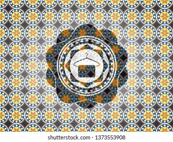 hanger with towel icon inside arabic badge background. Arabesque decoration.