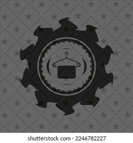 hanger with towel icon inside black badge. 