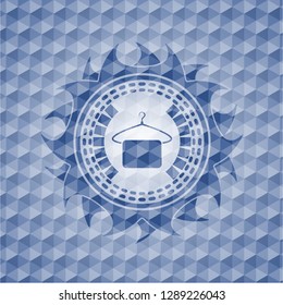 hanger with towel icon inside blue polygonal badge.