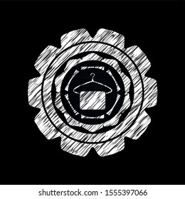 hanger with towel icon inside chalk emblem