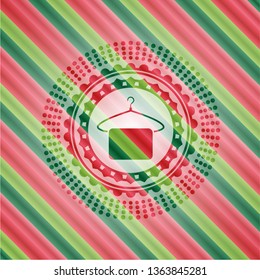 hanger with towel icon inside christmas colors style emblem.