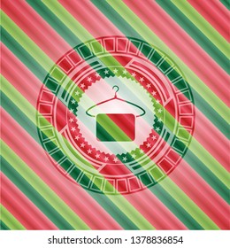 hanger with towel icon inside christmas style emblem.