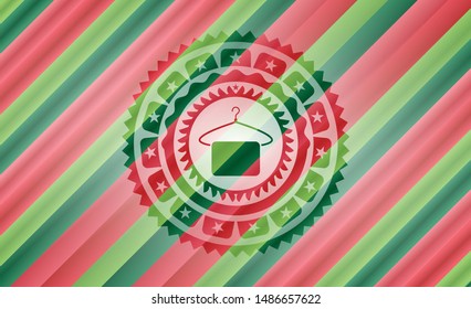 hanger with towel icon inside christmas colors badge.