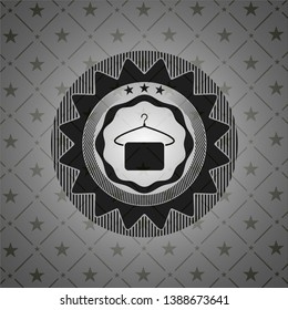 hanger with towel icon inside dark badge