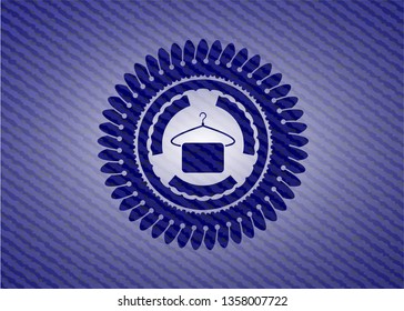 hanger with towel icon inside denim background