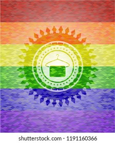 hanger with towel icon inside emblem on mosaic background with the colors of the LGBT flag