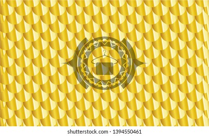 hanger with towel icon inside golden badge or emblem. Scales pattern. Vector Illustration. Detailed.