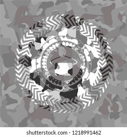 hanger with towel icon inside grey camo texture