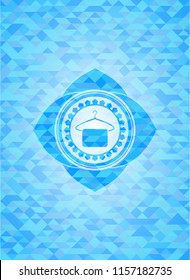hanger with towel icon inside light blue emblem. Mosaic background