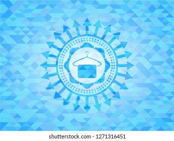 hanger with towel icon inside light blue emblem. Mosaic background