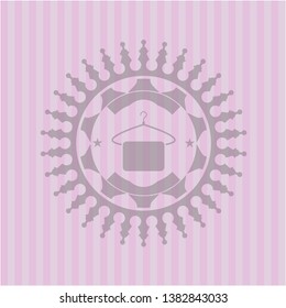 hanger with towel icon inside pink icon or emblem