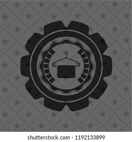 hanger with towel icon inside realistic dark emblem