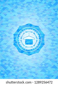 hanger with towel icon inside realistic light blue mosaic emblem