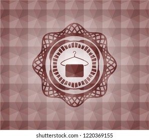 hanger with towel icon inside red geometric badge. Seamless.