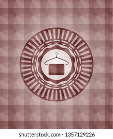 hanger with towel icon inside red polygonal badge. Seamless.