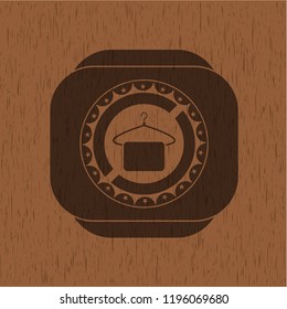 hanger with towel icon inside retro wooden emblem