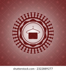 hanger with towel icon inside retro style red emblem. 