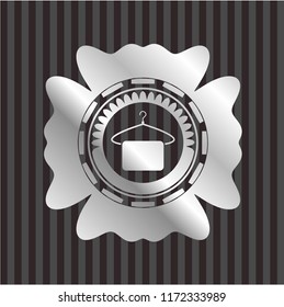 hanger with towel icon inside silver emblem
