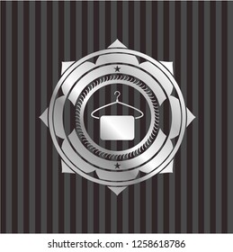 hanger with towel icon inside silver emblem or badge