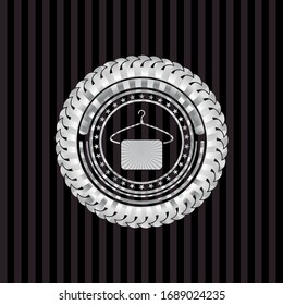 hanger with towel icon inside silver emblem