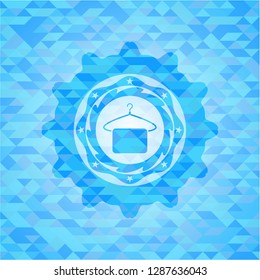 hanger with towel icon inside sky blue emblem with triangle mosaic background