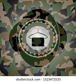 hanger with towel icon on camo texture