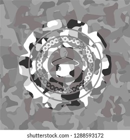 hanger with towel icon on grey camo texture