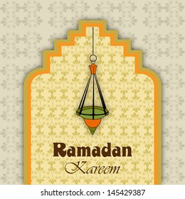 Hanging Arabic lantern on abstract  background for holy month of muslim community Ramadan Kareem.