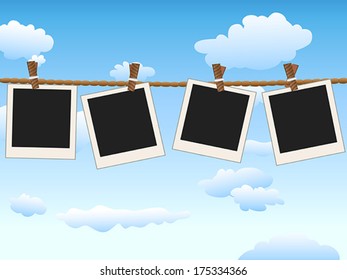 hanging Blank photo frames on blue sky