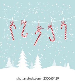 Hanging Candy Canes In Snowy Winter Scene