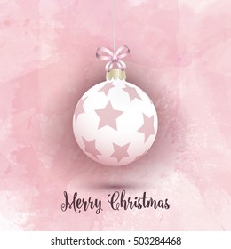 Hanging Christmas bauble on a pink watercolor background