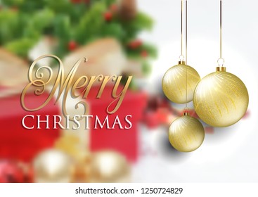 Hanging Christmas baubles on defocussed background