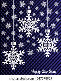 Hanging Christmas decorations-creative snowflakes on dark blue background with falling snowflakes