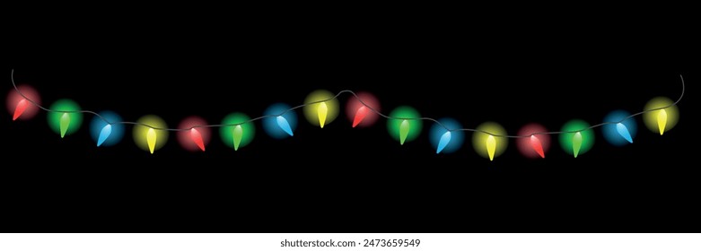 Hanging christmas lights garland isolated on black back background.