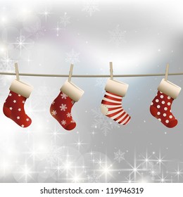 Hanging christmas socks on a clothesline. White christmas image.